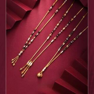 Rushbh Orna Aavira Luxe Gold Mangalsutra with black beads, delicate gold chains and textured decorative accents